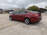 2015 Maroon /Black Ford Fusion SE (3FA6P0H95FR) with an 2.0L L4 DOHC 16V engine, Automatic transmission, located at 1830 North Belt Line Road, Irving, TX, 75061, (469) 524-0199, 32.834373, -96.993584 - Photo#5