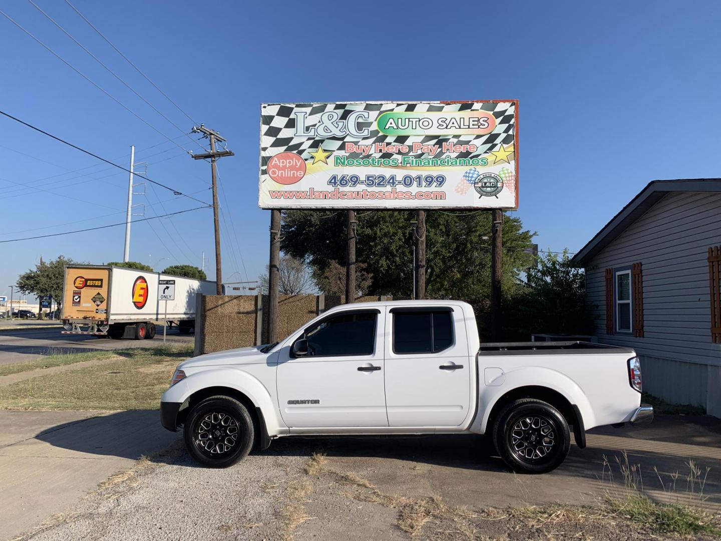 2012 White Suzuki Equator Sport Crew Cab 2WD (5Z61D0ER4CC) with an 4.0L V6 DOHC 24V engine, Automatic transmission, located at 1830 North Belt Line Road, Irving, TX, 75061, (469) 524-0199, 32.834373, -96.993584 - Photo#0