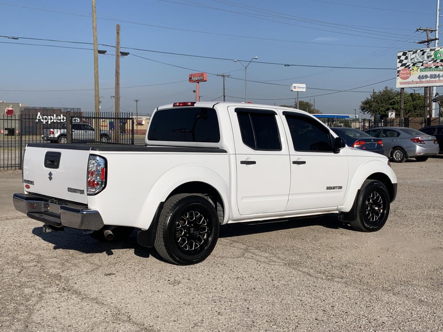 2012 White Suzuki Equator Sport Crew Cab 2WD (5Z61D0ER4CC) with an 4.0L V6 DOHC 24V engine, Automatic transmission, located at 1830 North Belt Line Road, Irving, TX, 75061, (469) 524-0199, 32.834373, -96.993584 - Photo#5