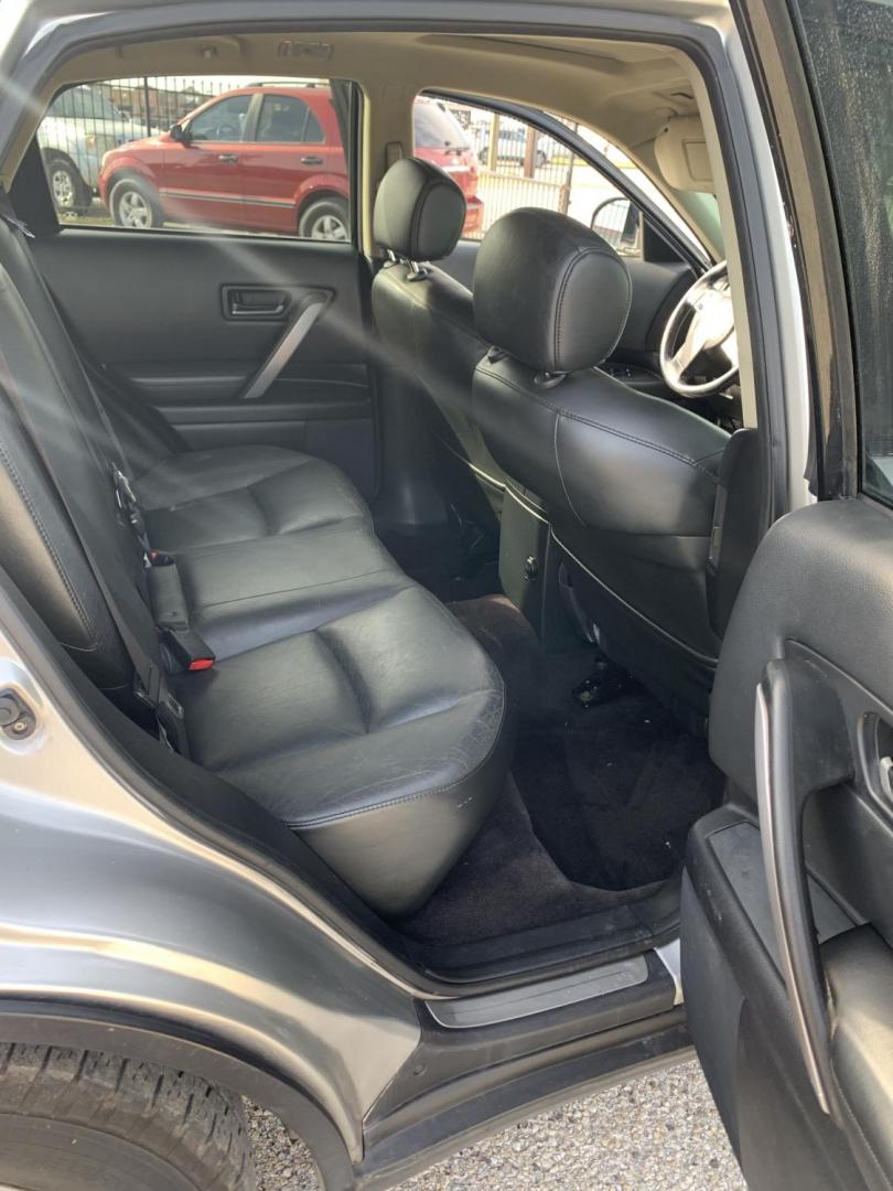 2004 Gray Infiniti FX FX35 AWD (JNRAS08W24X) with an 3.5L V6 DOHC 32V engine, Automatic transmission, located at 1830 North Belt Line Road, Irving, TX, 75061, (469) 524-0199, 32.834373, -96.993584 - Photo#10