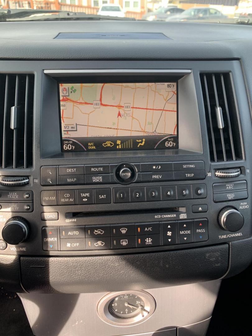 2004 Gray Infiniti FX FX35 AWD (JNRAS08W24X) with an 3.5L V6 DOHC 32V engine, Automatic transmission, located at 1830 North Belt Line Road, Irving, TX, 75061, (469) 524-0199, 32.834373, -96.993584 - Photo#12