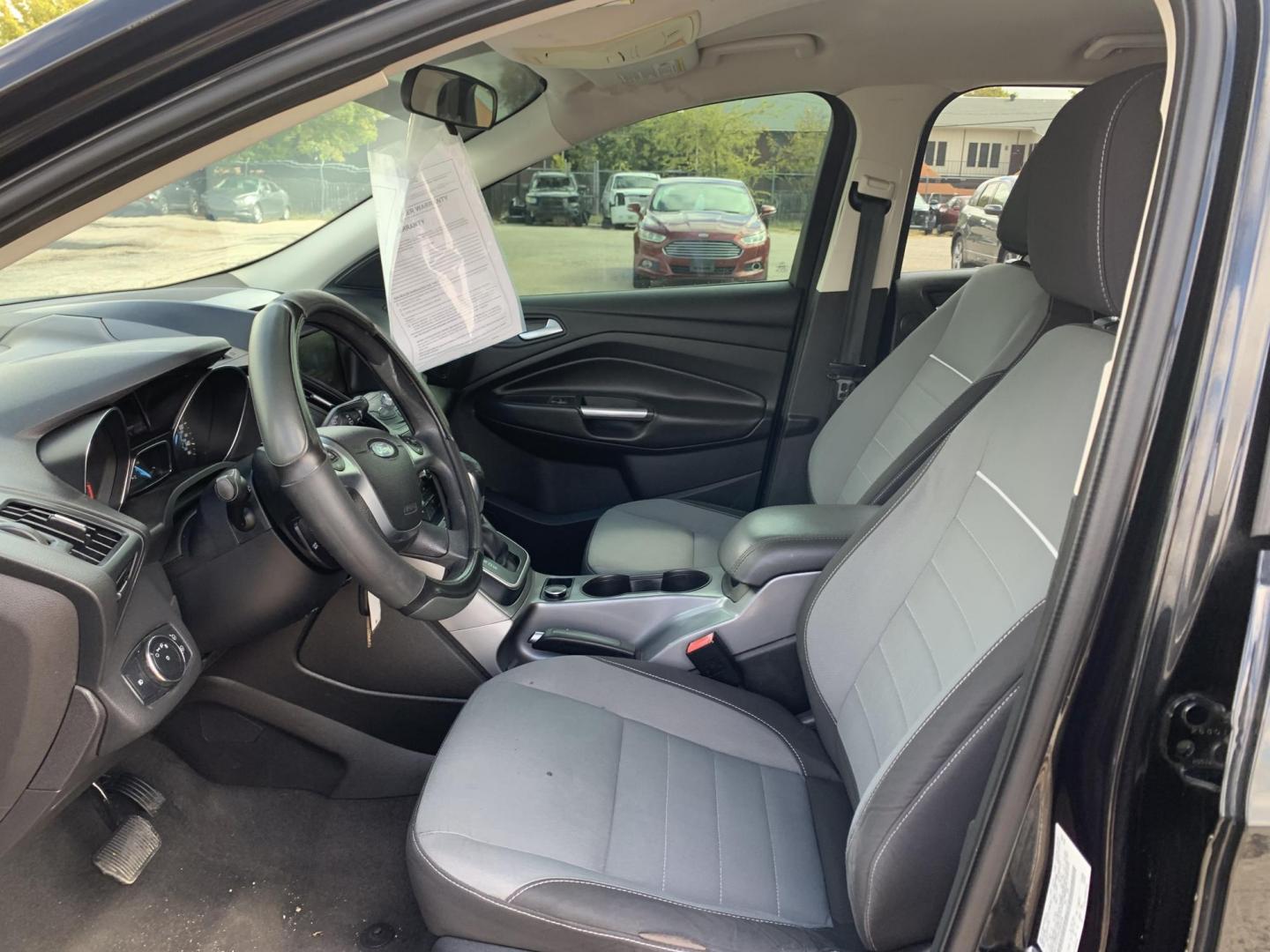 2013 Black /gray Ford Escape SE AWD (1FMCU9GX2DU) with an 1.6L L4 DOHC 16V engine, Automatic transmission, located at 1830 North Belt Line Road, Irving, TX, 75061, (469) 524-0199, 32.834373, -96.993584 - Photo#9