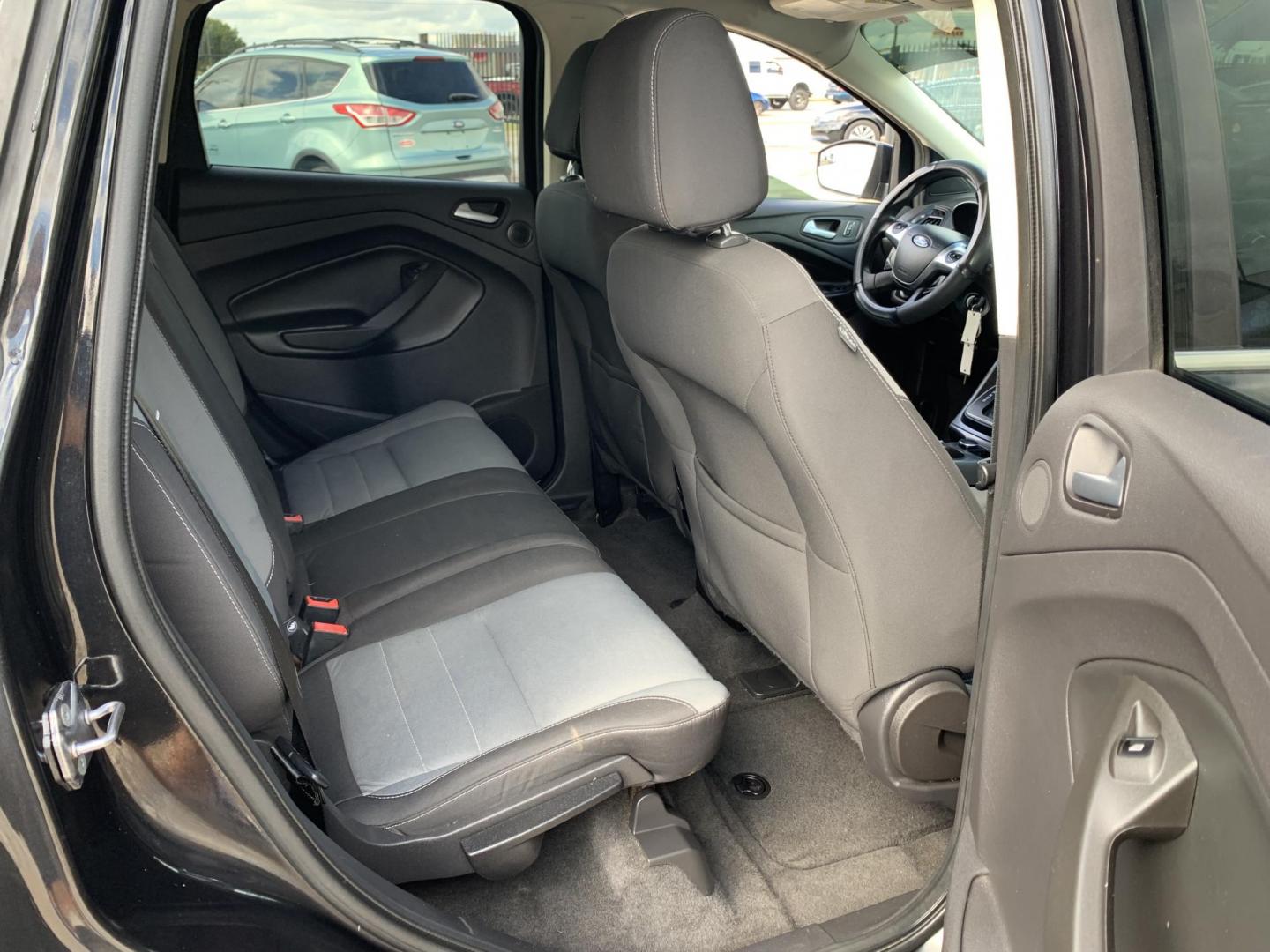 2013 Black /gray Ford Escape SE AWD (1FMCU9GX2DU) with an 1.6L L4 DOHC 16V engine, Automatic transmission, located at 1830 North Belt Line Road, Irving, TX, 75061, (469) 524-0199, 32.834373, -96.993584 - Photo#11