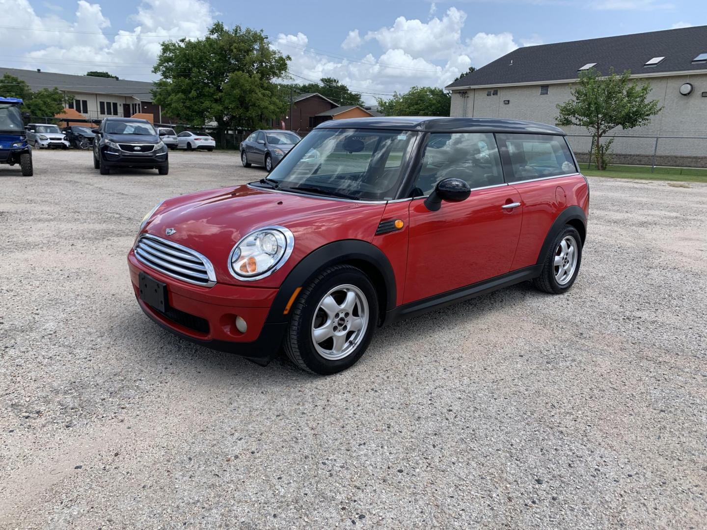 2009 Red /Black Mini Clubman Base (WMWML33599T) with an 1.6L L4 DOHC 16V engine, Automatic transmission, located at 1830 North Belt Line Road, Irving, TX, 75061, (469) 524-0199, 32.834373, -96.993584 - Photo#2