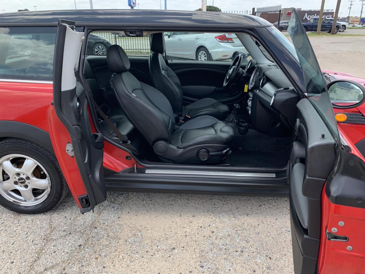 2009 Red /Black Mini Clubman Base (WMWML33599T) with an 1.6L L4 DOHC 16V engine, Automatic transmission, located at 1830 North Belt Line Road, Irving, TX, 75061, (469) 524-0199, 32.834373, -96.993584 - Photo#10