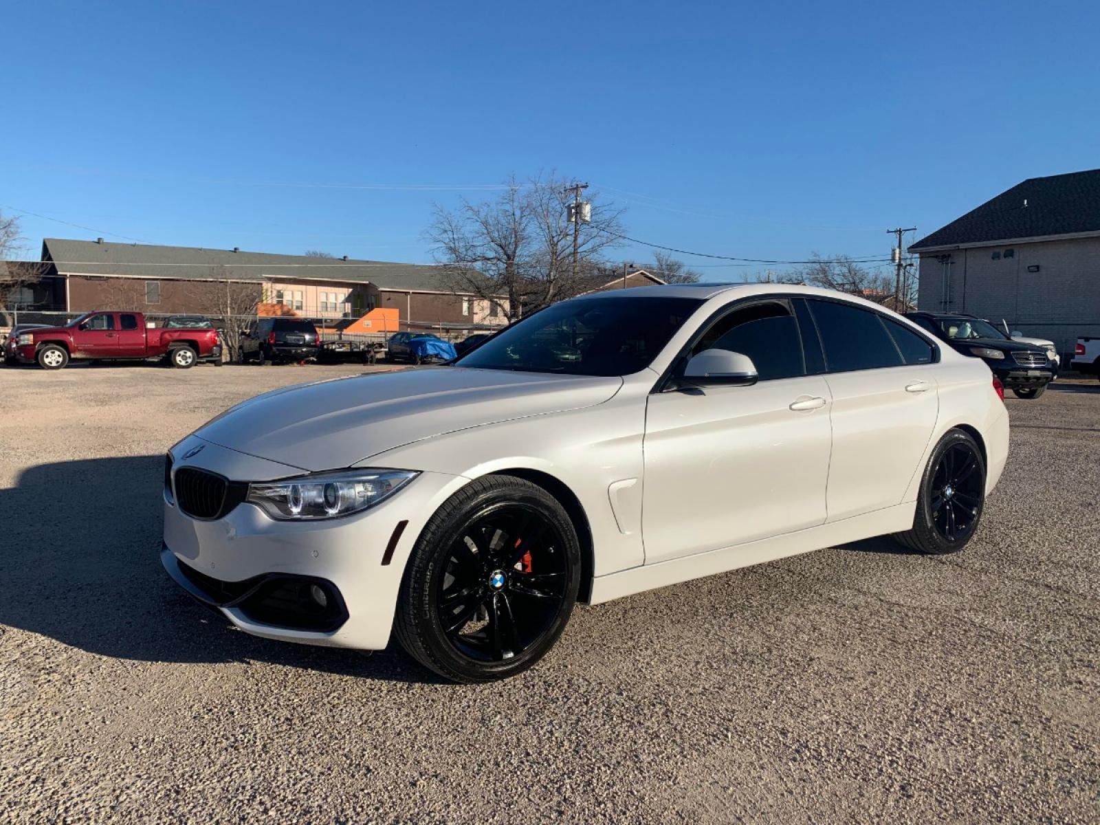 2016 White /Red BMW 4-Series Gran Coupe 428i SULEV (WBA4A9C59GG) with an 2.0L L4 DOHC 16V engine, 8A transmission, located at 1830 North Belt Line Road, Irving, TX, 75061, (469) 524-0199, 32.834373, -96.993584 - Owners personal vehicle. Runs and drives perfect! Rebuilt Title - Photo #2