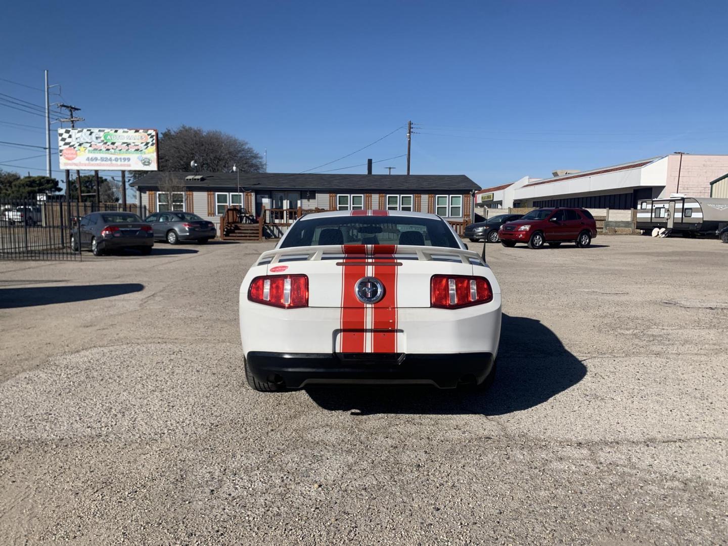 2010 White /Black Ford Mustang V6 Coupe (1ZVBP8AN2A5) with an 4.0L V6 OHC 12V engine, AUTOMATIC transmission, located at 1830 North Belt Line Road, Irving, TX, 75061, (469) 524-0199, 32.834373, -96.993584 - Photo#4