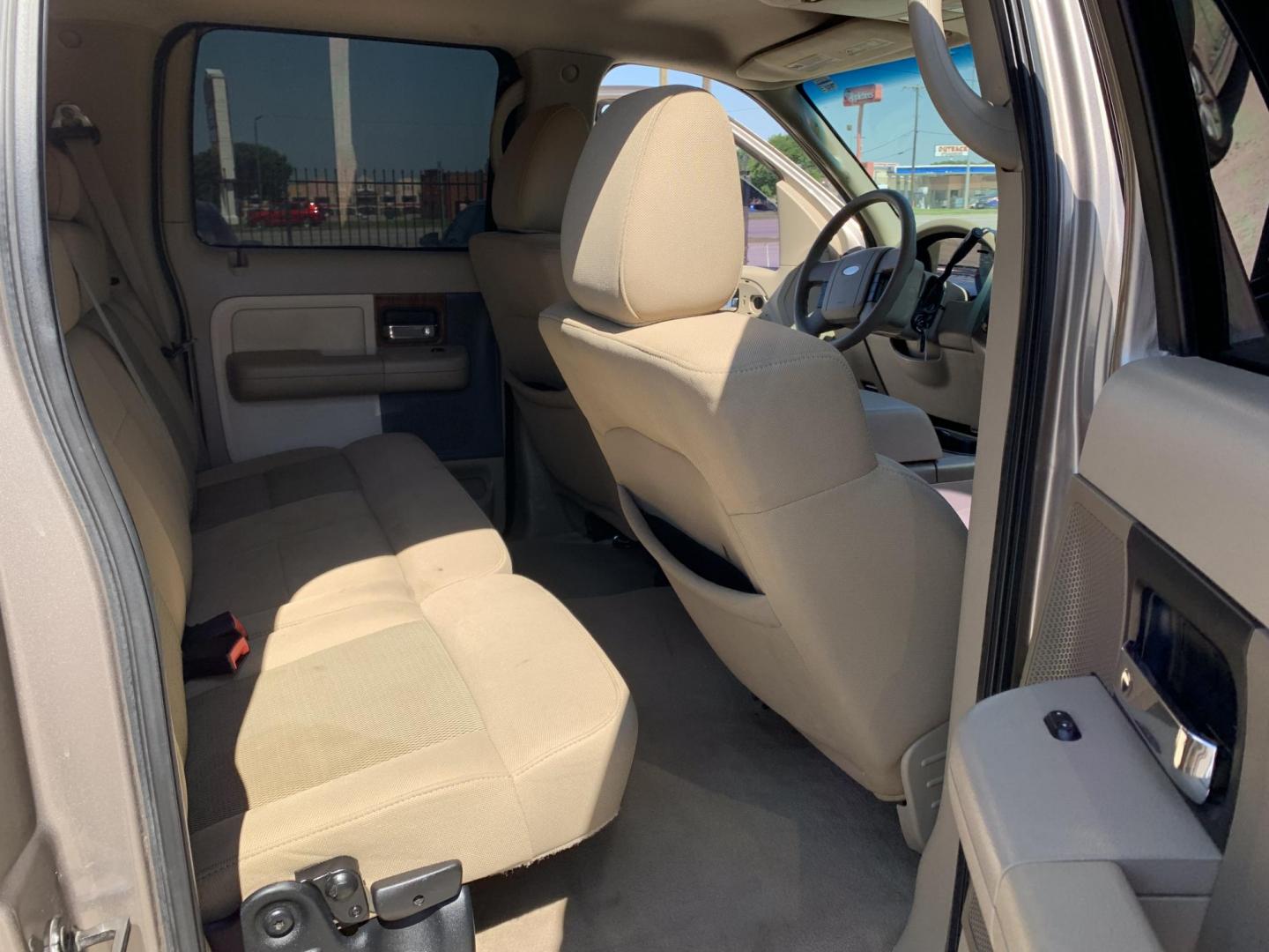 2006 Gold /Tan Ford F-150 Lariat SuperCrew 2WD (1FTPW12516K) with an 5.4L V6 SOHC 16V engine, Automatic transmission, located at 1830 North Belt Line Road, Irving, TX, 75061, (469) 524-0199, 32.834373, -96.993584 - Photo#9