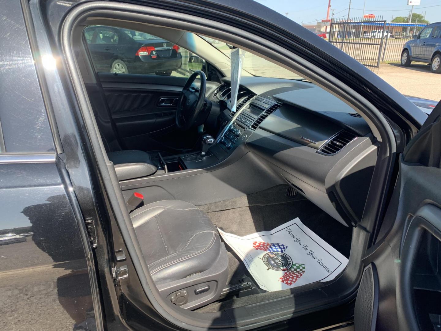 2012 Black Ford Taurus SEL FWD (1FAHP2EW7CG) with an 3.5L V6 DOHC 24V engine, Automatic transmission, located at 1830 North Belt Line Road, Irving, TX, 75061, (469) 524-0199, 32.834373, -96.993584 - Photo#8