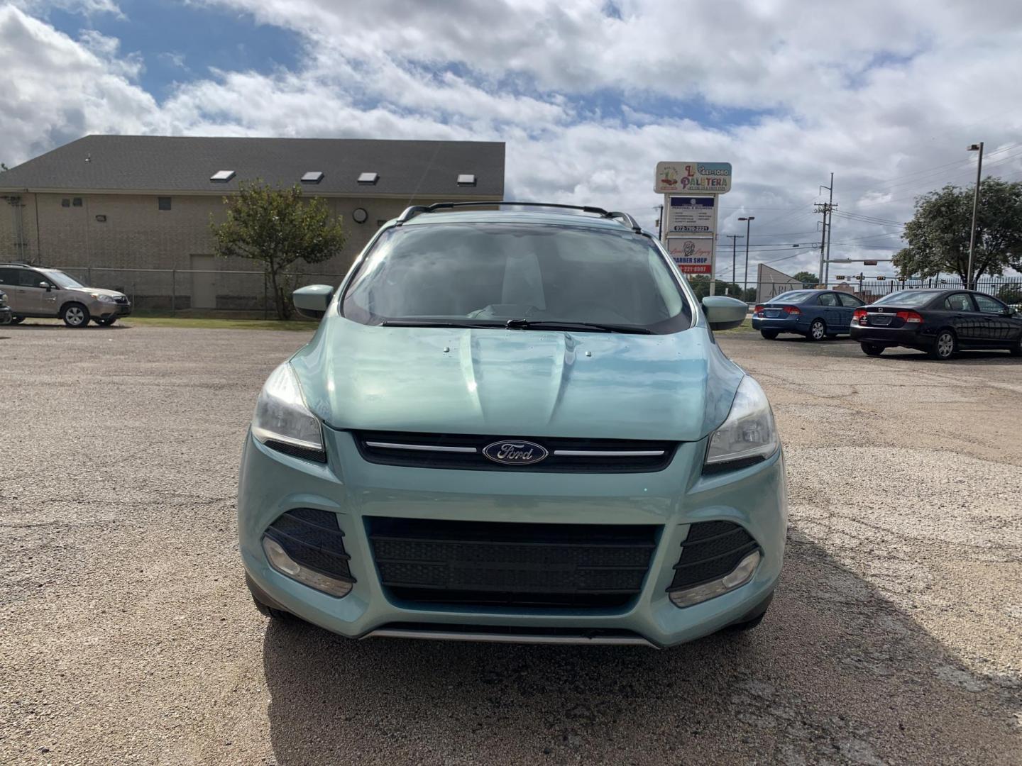 2013 Blue /Tan Ford Escape SE FWD (1FMCU0GX9DU) with an 1.6L L4 DOHC 16V engine, Automatic transmission, located at 1830 North Belt Line Road, Irving, TX, 75061, (469) 524-0199, 32.834373, -96.993584 - Photo#1