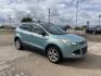2013 Blue /Tan Ford Escape SE FWD (1FMCU0GX9DU) with an 1.6L L4 DOHC 16V engine, Automatic transmission, located at 1830 North Belt Line Road, Irving, TX, 75061, (469) 524-0199, 32.834373, -96.993584 - Photo#4