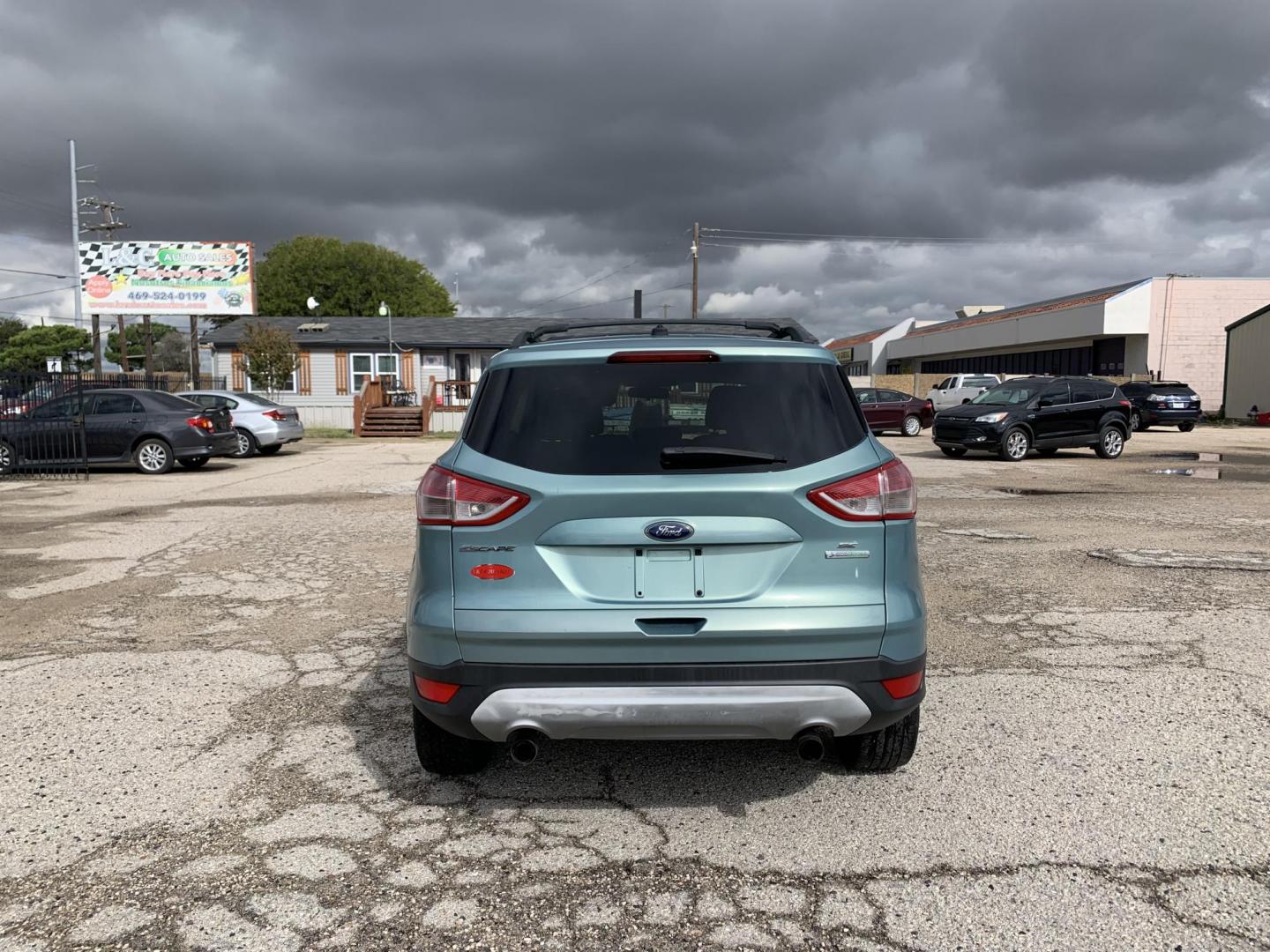 2013 Blue /Tan Ford Escape SE FWD (1FMCU0GX9DU) with an 1.6L L4 DOHC 16V engine, Automatic transmission, located at 1830 North Belt Line Road, Irving, TX, 75061, (469) 524-0199, 32.834373, -96.993584 - Photo#6