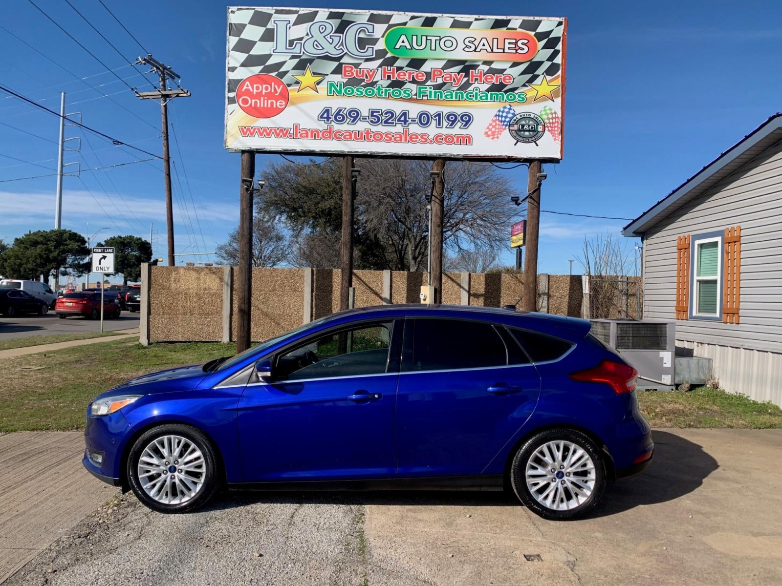 2015 Blue /Black Ford Focus Titanium Hatch (1FADP3N21FL) with an 2.0L L4 DOHC 16V engine, Automatic transmission, located at 1830 North Belt Line Road, Irving, TX, 75061, (469) 524-0199, 32.834373, -96.993584 - Photo #0