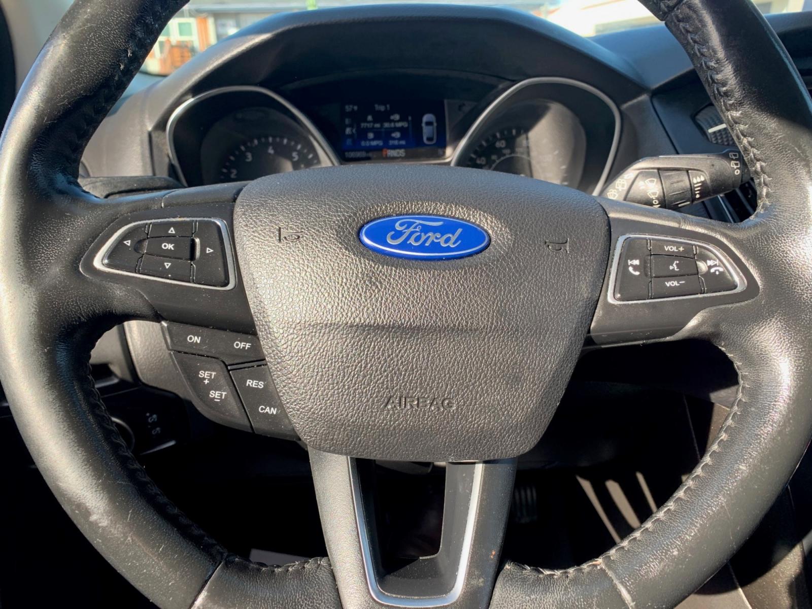 2015 Blue /Black Ford Focus Titanium Hatch (1FADP3N21FL) with an 2.0L L4 DOHC 16V engine, Automatic transmission, located at 1830 North Belt Line Road, Irving, TX, 75061, (469) 524-0199, 32.834373, -96.993584 - Photo #15