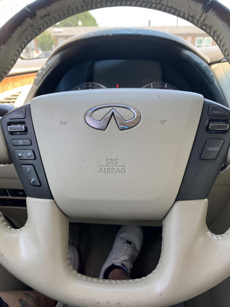 2011 White /Tan Infiniti QX56 2WD (JN8AZ2NF1B9) with an 5.6L V8 DOHC 32V engine, AUTOMATIC transmission, located at 1830 North Belt Line Road, Irving, TX, 75061, (469) 524-0199, 32.834373, -96.993584 - Photo#16