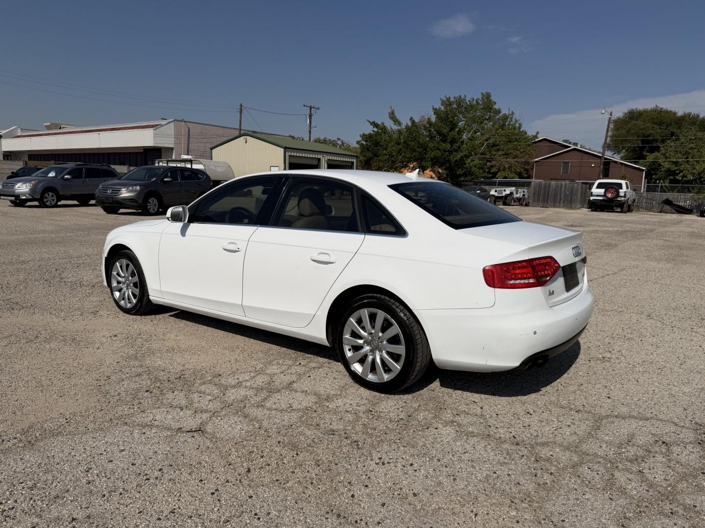 2010 White /Tan Audi A4 (WAUEFAFLXAN) with an 4 Cylinders F 2.0L FI Turbo DOHC 121 CID engine, AUTOMATIC transmission, located at 1830 North Belt Line Road, Irving, TX, 75061, (469) 524-0199, 32.834373, -96.993584- Photo#3