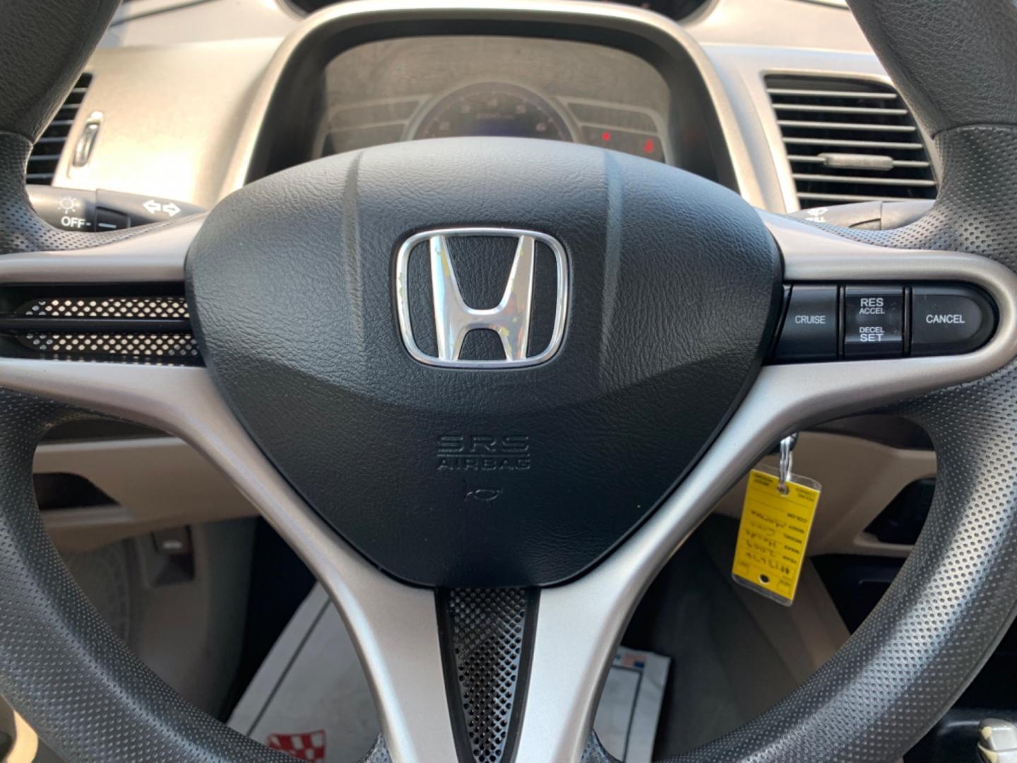 2009 Maroon /Tan Honda Civic LX (1HGFA16569L) with an 1.8L 1799cc GAS MFI type R18A1 - 4 valve SOHC engine, Automatic transmission, located at 1830 North Belt Line Road, Irving, TX, 75061, (469) 524-0199, 32.834373, -96.993584 - Photo#10