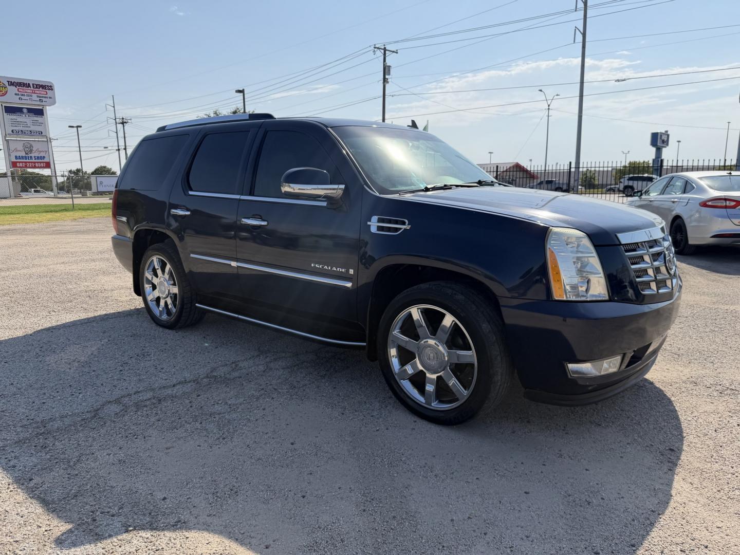 2007 blue /Tan Cadillac Escalade 2WD (1GYEC63877R) with an 6.2L V8 OHV 16V engine, AUTOMATIC transmission, located at 1830 North Belt Line Road, Irving, TX, 75061, (469) 524-0199, 32.834373, -96.993584- Photo#6