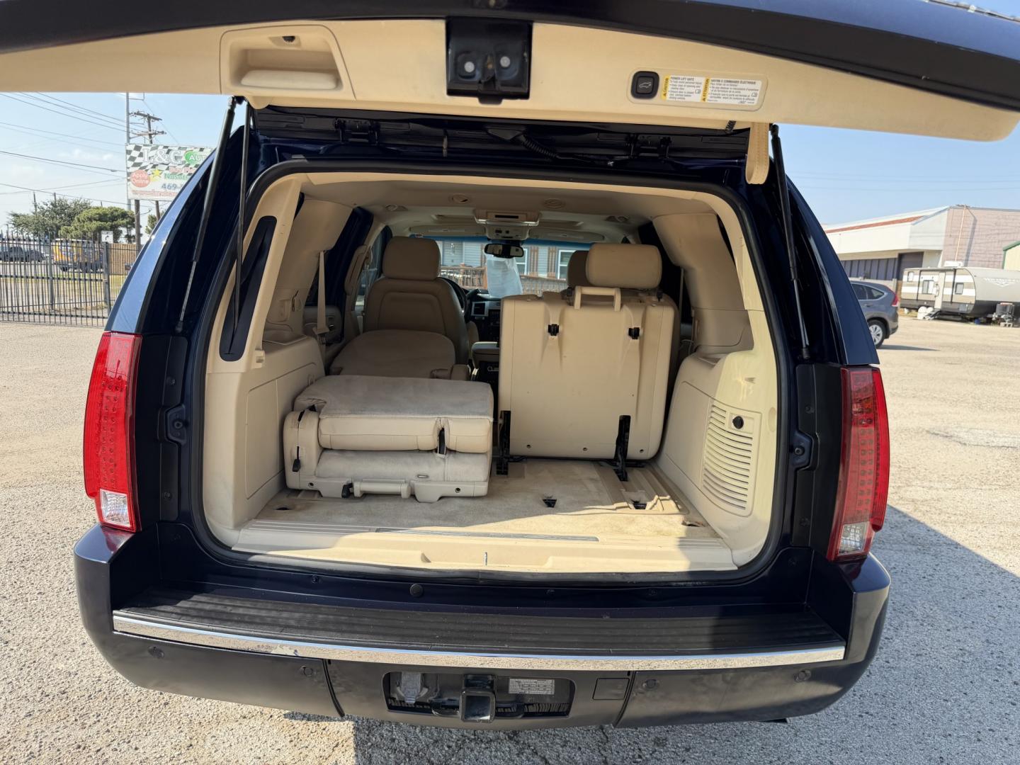 2007 blue /Tan Cadillac Escalade 2WD (1GYEC63877R) with an 6.2L V8 OHV 16V engine, AUTOMATIC transmission, located at 1830 North Belt Line Road, Irving, TX, 75061, (469) 524-0199, 32.834373, -96.993584- Photo#4