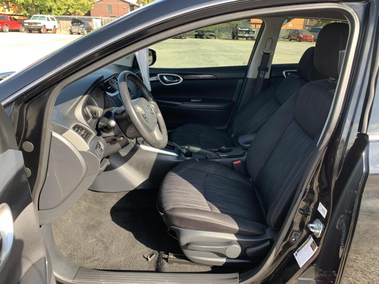 2019 Black /Black Nissan Sentra S CVT (3N1AB7APXKY) with an 1.8L L4 SFI DOHC 16V engine, AUTOMATIC transmission, located at 1830 North Belt Line Road, Irving, TX, 75061, (469) 524-0199, 32.834373, -96.993584 - Photo#7