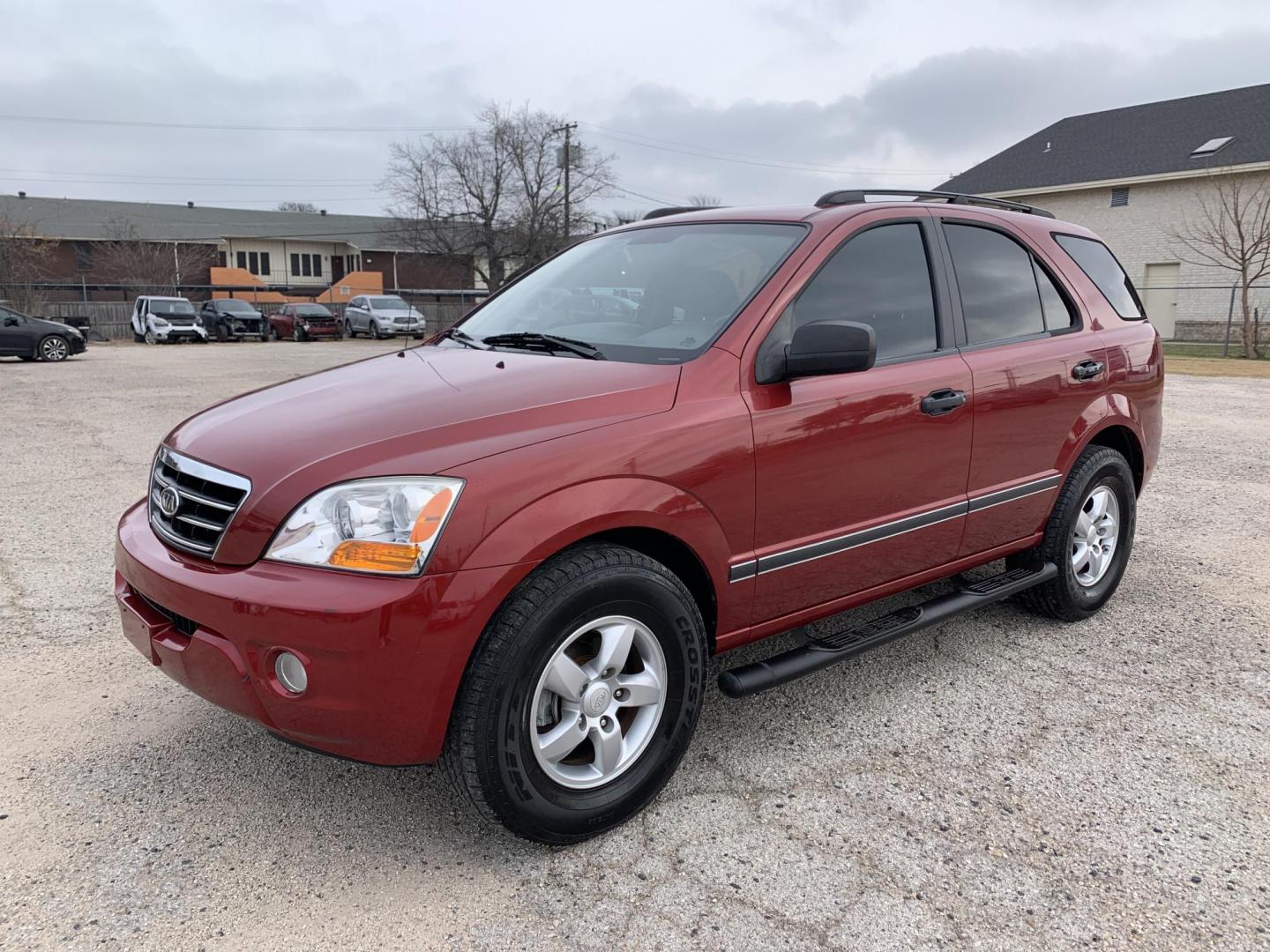 2008 Maroon /gray Kia Sorento Base (KNDJD735785) with an 3.3L V6 DOHC 24V engine, AUTOMATIC transmission, located at 1830 North Belt Line Road, Irving, TX, 75061, (469) 524-0199, 32.834373, -96.993584 - New Arrival Low Miles Coming Soon - Photo#1