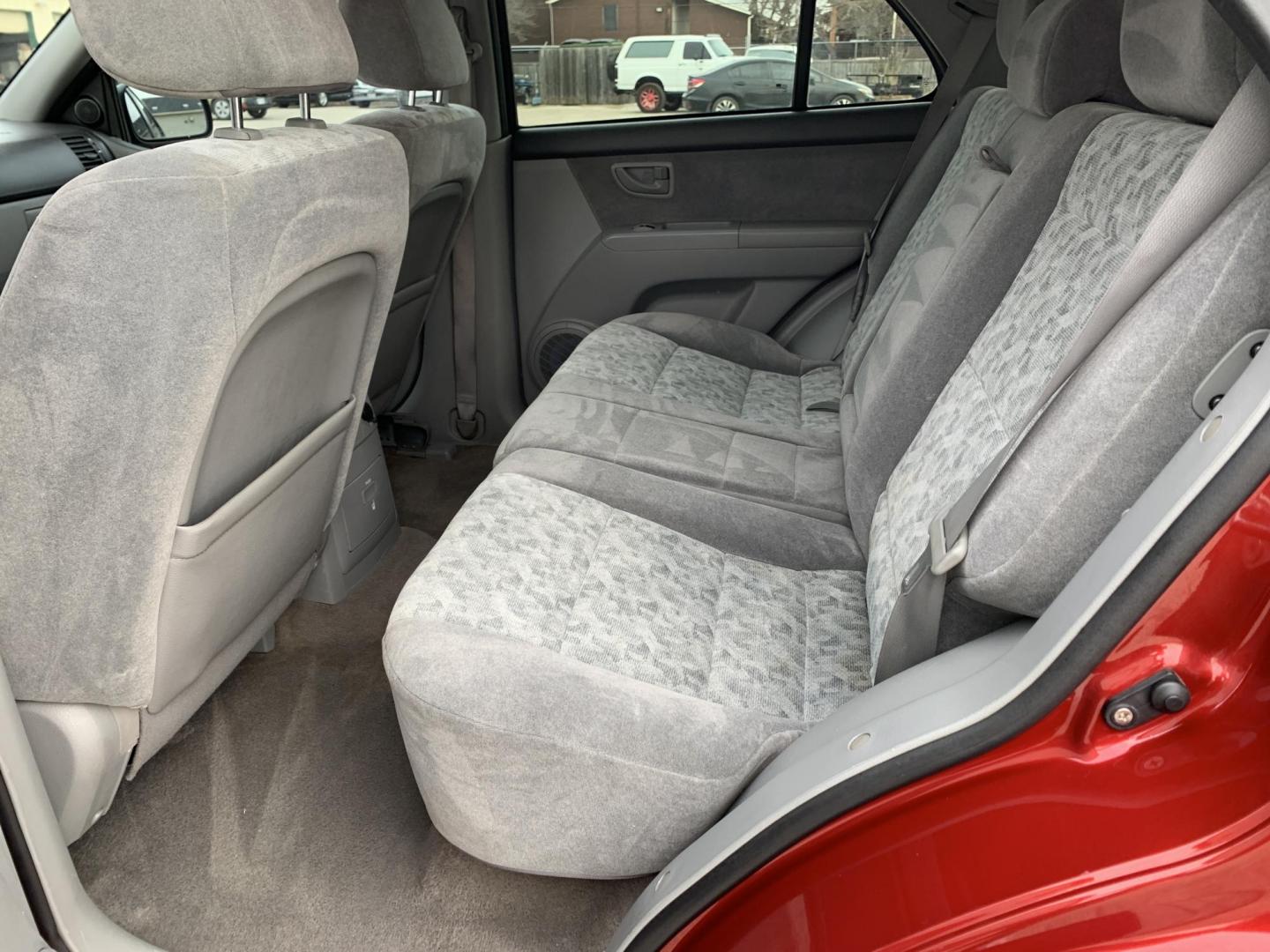 2008 Maroon /gray Kia Sorento Base (KNDJD735785) with an 3.3L V6 DOHC 24V engine, AUTOMATIC transmission, located at 1830 North Belt Line Road, Irving, TX, 75061, (469) 524-0199, 32.834373, -96.993584 - New Arrival Low Miles Coming Soon - Photo#7