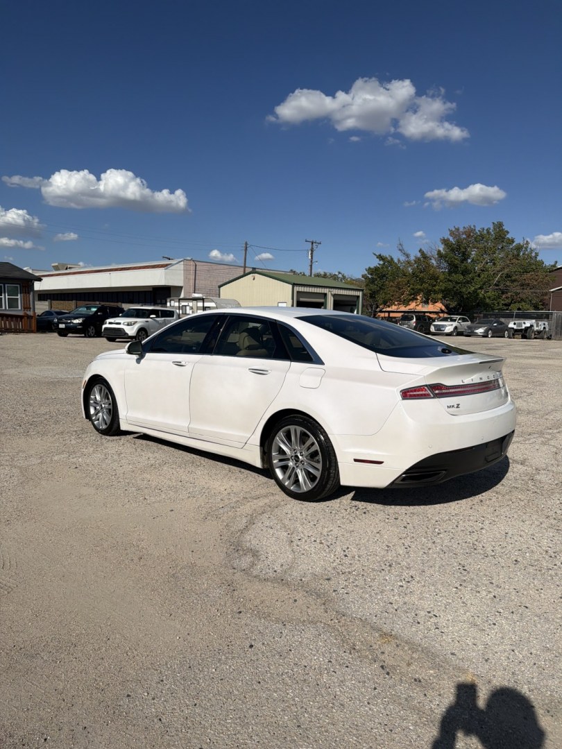 2014 White /Tan Lincoln MKZ FWD (3LN6L2G98ER) with an 2.0L L4 DOHC 16V engine, AUTOMATIC transmission, located at 1830 North Belt Line Road, Irving, TX, 75061, (469) 524-0199, 32.834373, -96.993584- Photo#3