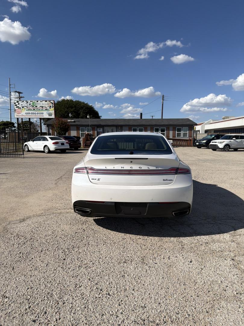 2014 White /Tan Lincoln MKZ FWD (3LN6L2G98ER) with an 2.0L L4 DOHC 16V engine, AUTOMATIC transmission, located at 1830 North Belt Line Road, Irving, TX, 75061, (469) 524-0199, 32.834373, -96.993584- Photo#4