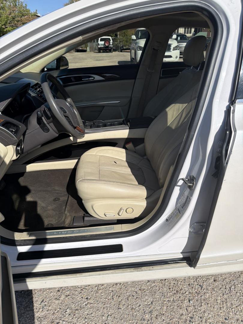 2014 White /Tan Lincoln MKZ FWD (3LN6L2G98ER) with an 2.0L L4 DOHC 16V engine, AUTOMATIC transmission, located at 1830 North Belt Line Road, Irving, TX, 75061, (469) 524-0199, 32.834373, -96.993584- Photo#7