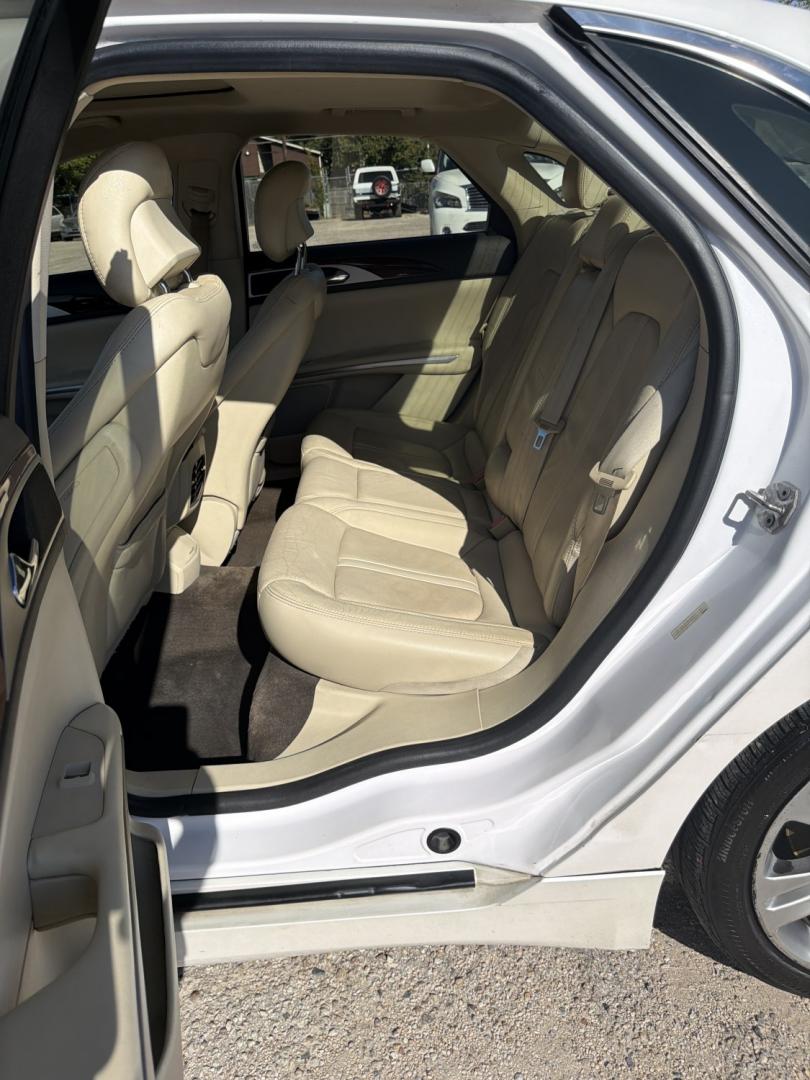 2014 White /Tan Lincoln MKZ FWD (3LN6L2G98ER) with an 2.0L L4 DOHC 16V engine, AUTOMATIC transmission, located at 1830 North Belt Line Road, Irving, TX, 75061, (469) 524-0199, 32.834373, -96.993584- Photo#8