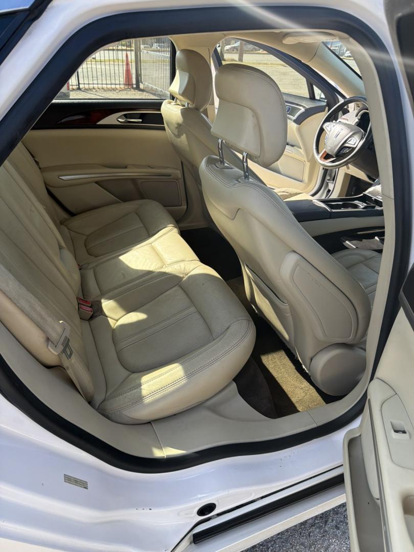 2014 White /Tan Lincoln MKZ FWD (3LN6L2G98ER) with an 2.0L L4 DOHC 16V engine, AUTOMATIC transmission, located at 1830 North Belt Line Road, Irving, TX, 75061, (469) 524-0199, 32.834373, -96.993584- Photo#9