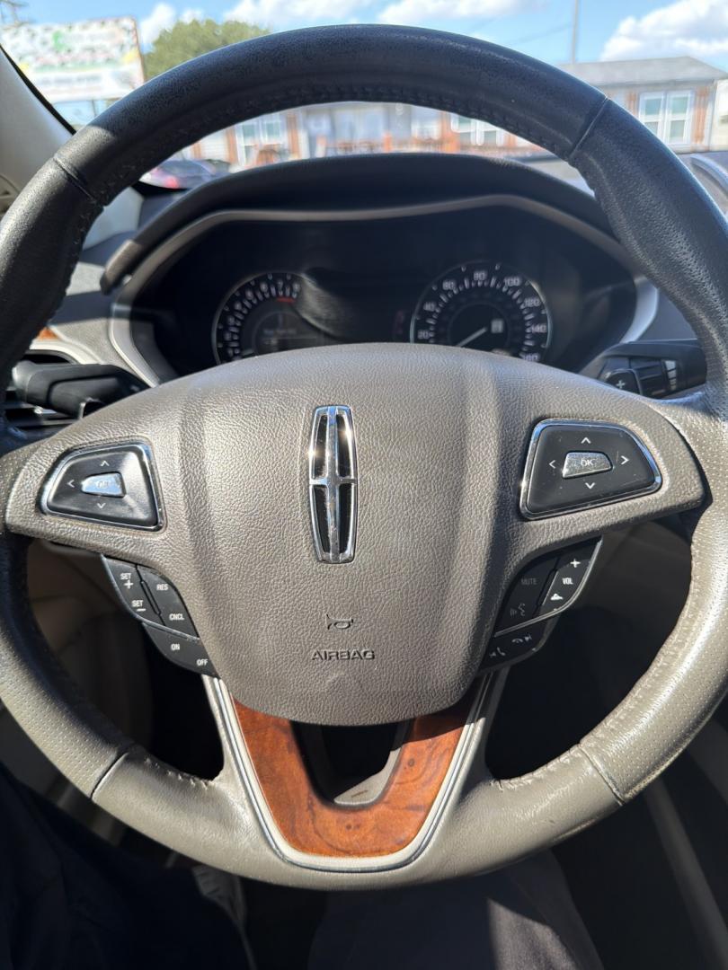 2014 White /Tan Lincoln MKZ FWD (3LN6L2G98ER) with an 2.0L L4 DOHC 16V engine, AUTOMATIC transmission, located at 1830 North Belt Line Road, Irving, TX, 75061, (469) 524-0199, 32.834373, -96.993584- Photo#15