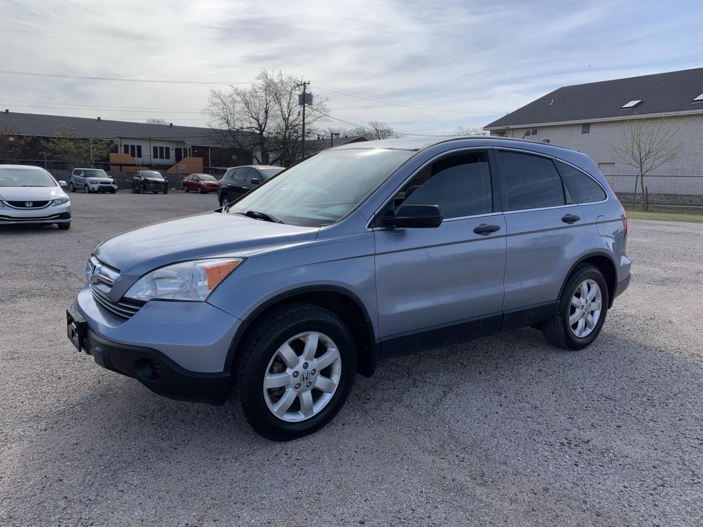 2009 Blue /gray Honda CR-V EX 2WD (JHLRE38539C) with an 2.4L L4 DOHC 16V engine, Automatic transmission, located at 1830 North Belt Line Road, Irving, TX, 75061, (469) 524-0199, 32.834373, -96.993584 - Photo#2