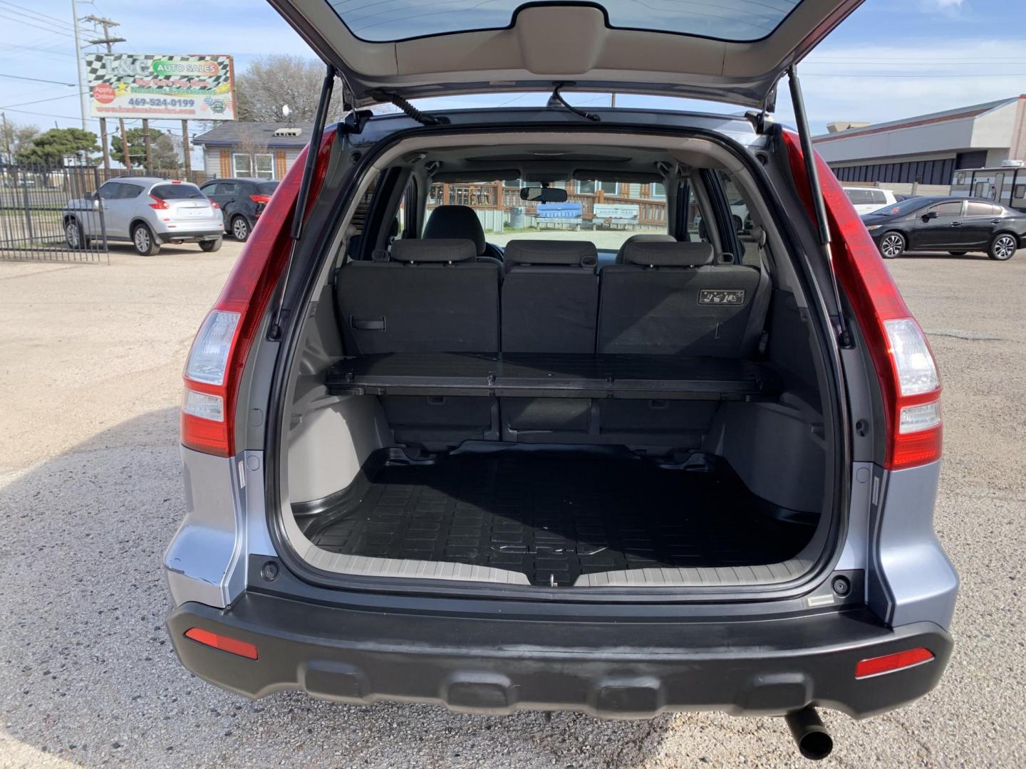 2009 Blue /gray Honda CR-V EX 2WD (JHLRE38539C) with an 2.4L L4 DOHC 16V engine, Automatic transmission, located at 1830 North Belt Line Road, Irving, TX, 75061, (469) 524-0199, 32.834373, -96.993584 - Photo#11