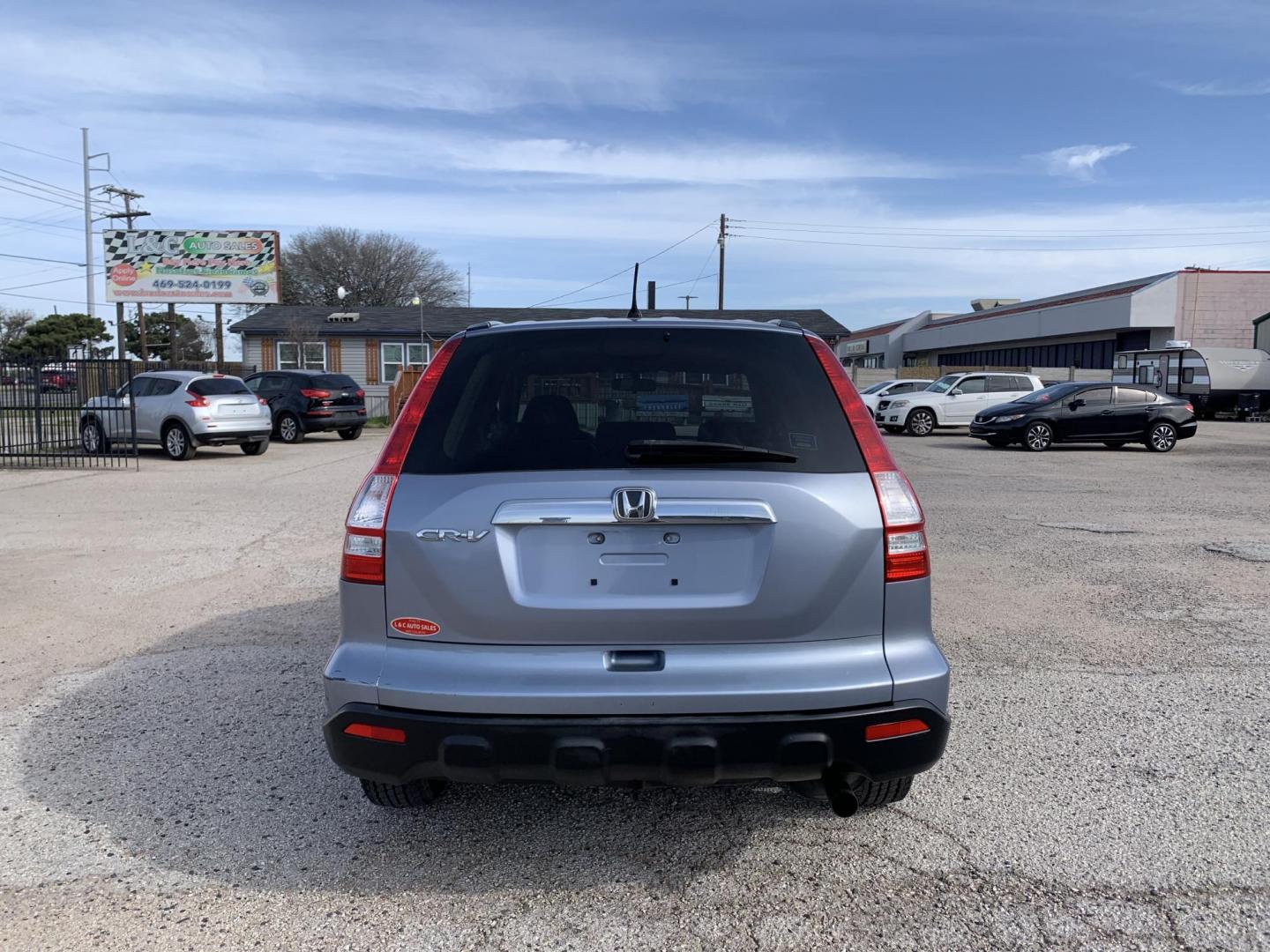 2009 Blue /gray Honda CR-V EX 2WD (JHLRE38539C) with an 2.4L L4 DOHC 16V engine, Automatic transmission, located at 1830 North Belt Line Road, Irving, TX, 75061, (469) 524-0199, 32.834373, -96.993584 - Photo#4