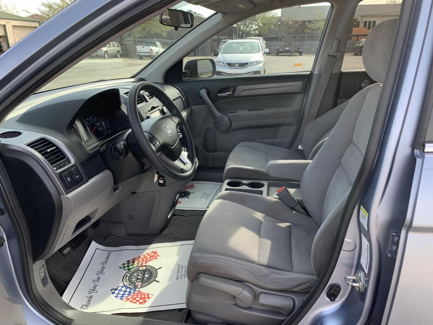 2009 Blue /gray Honda CR-V EX 2WD (JHLRE38539C) with an 2.4L L4 DOHC 16V engine, Automatic transmission, located at 1830 North Belt Line Road, Irving, TX, 75061, (469) 524-0199, 32.834373, -96.993584 - Photo#9