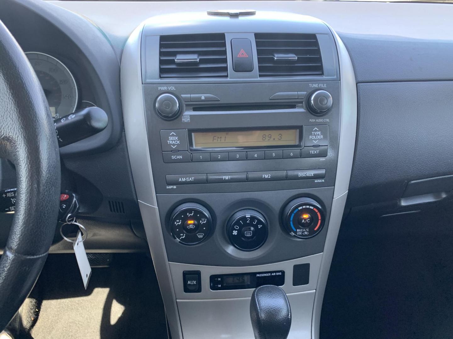 2010 Charcoal gray /Black Toyota Corolla (1NXBU4EE6AZ) with an 1.8L L4 DOHC 16V engine, Automatic transmission, located at 1830 North Belt Line Road, Irving, TX, 75061, (469) 524-0199, 32.834373, -96.993584 - ONE OWNER - Photo#12