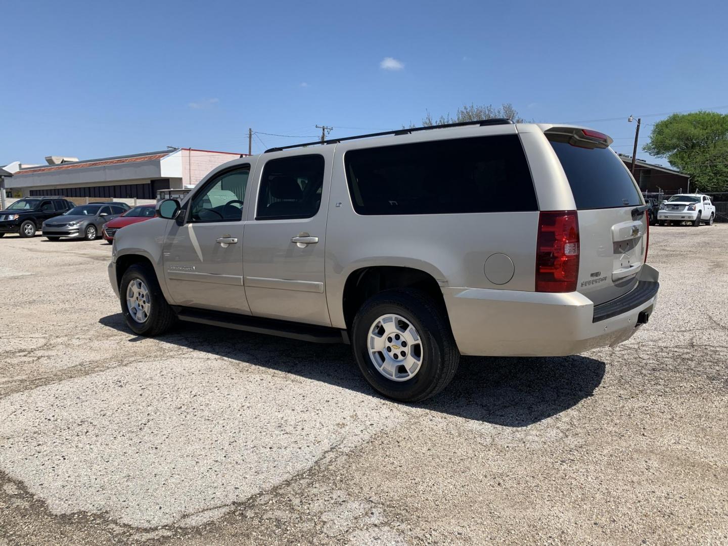 2008 Gold /Tan Chevrolet Suburban LS 1500 2WD (3GNFC16J48G) with an 5.3L V8 OHV 16V engine, Automatic transmission, located at 1830 North Belt Line Road, Irving, TX, 75061, (469) 524-0199, 32.834373, -96.993584 - ONE OWNER - Photo#3