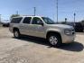 2008 Gold /Tan Chevrolet Suburban LS 1500 2WD (3GNFC16J48G) with an 5.3L V8 OHV 16V engine, Automatic transmission, located at 1830 North Belt Line Road, Irving, TX, 75061, (469) 524-0199, 32.834373, -96.993584 - Photo#4