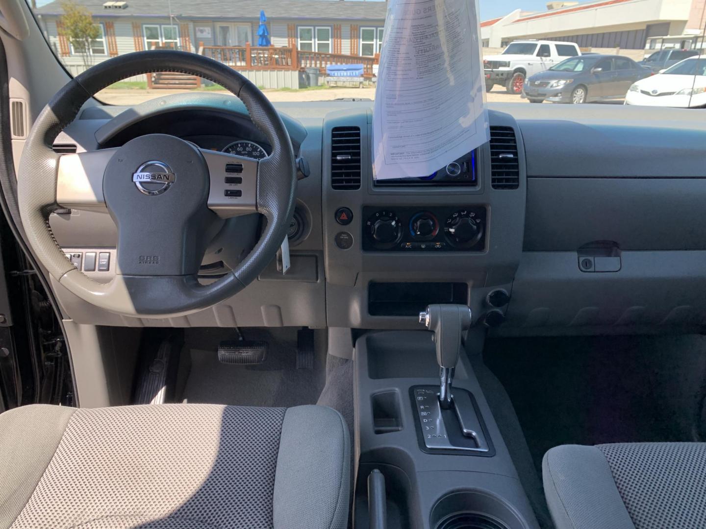 2007 Black /gray Nissan Frontier LE Crew Cab Long Bed 2WD (1N6AD09U87C) with an 4.0L V6 DOHC 24V engine, Automatic transmission, located at 1830 North Belt Line Road, Irving, TX, 75061, (469) 524-0199, 32.834373, -96.993584 - Photo#12
