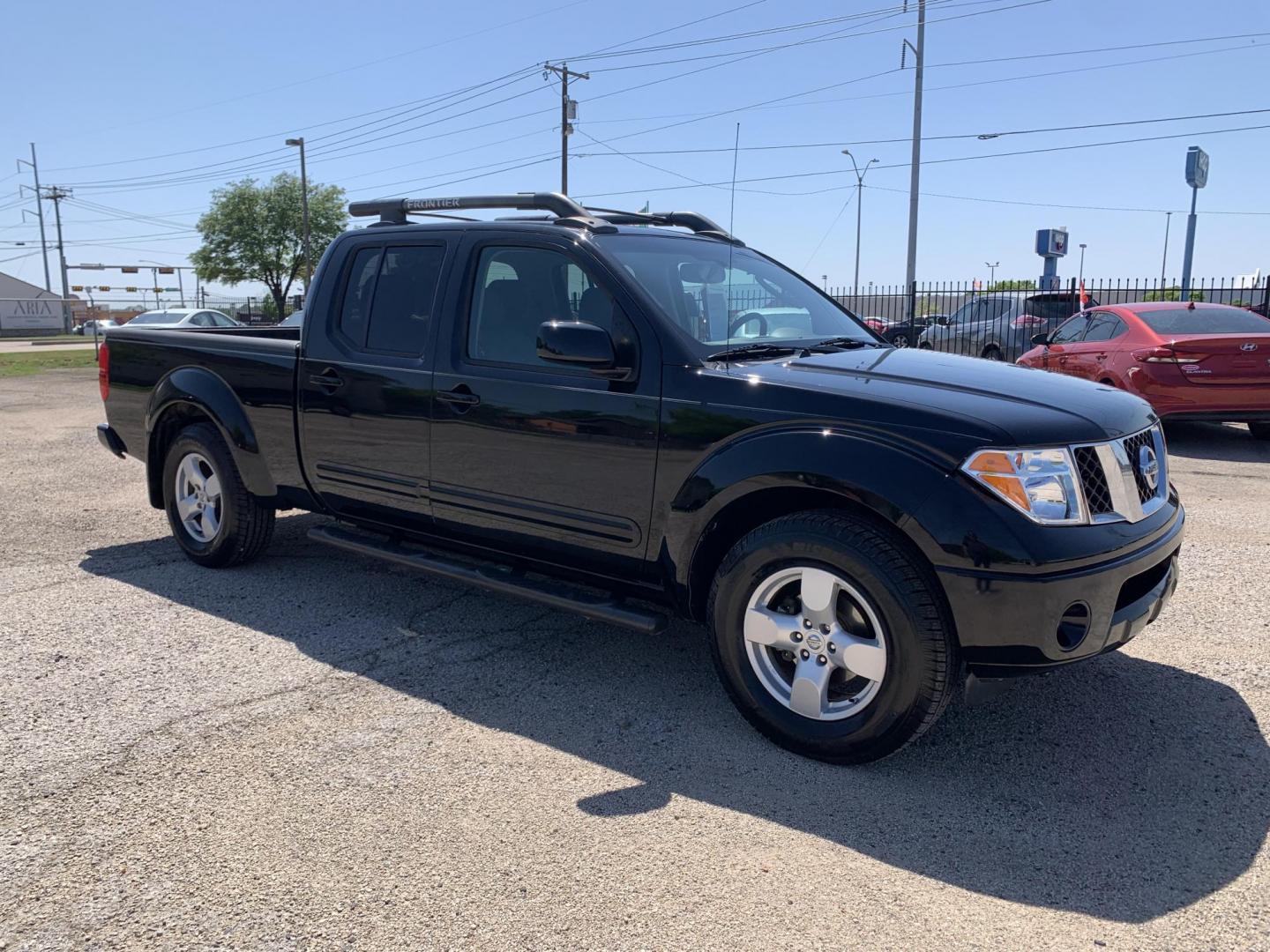 2007 Black /gray Nissan Frontier LE Crew Cab Long Bed 2WD (1N6AD09U87C) with an 4.0L V6 DOHC 24V engine, Automatic transmission, located at 1830 North Belt Line Road, Irving, TX, 75061, (469) 524-0199, 32.834373, -96.993584 - Photo#6