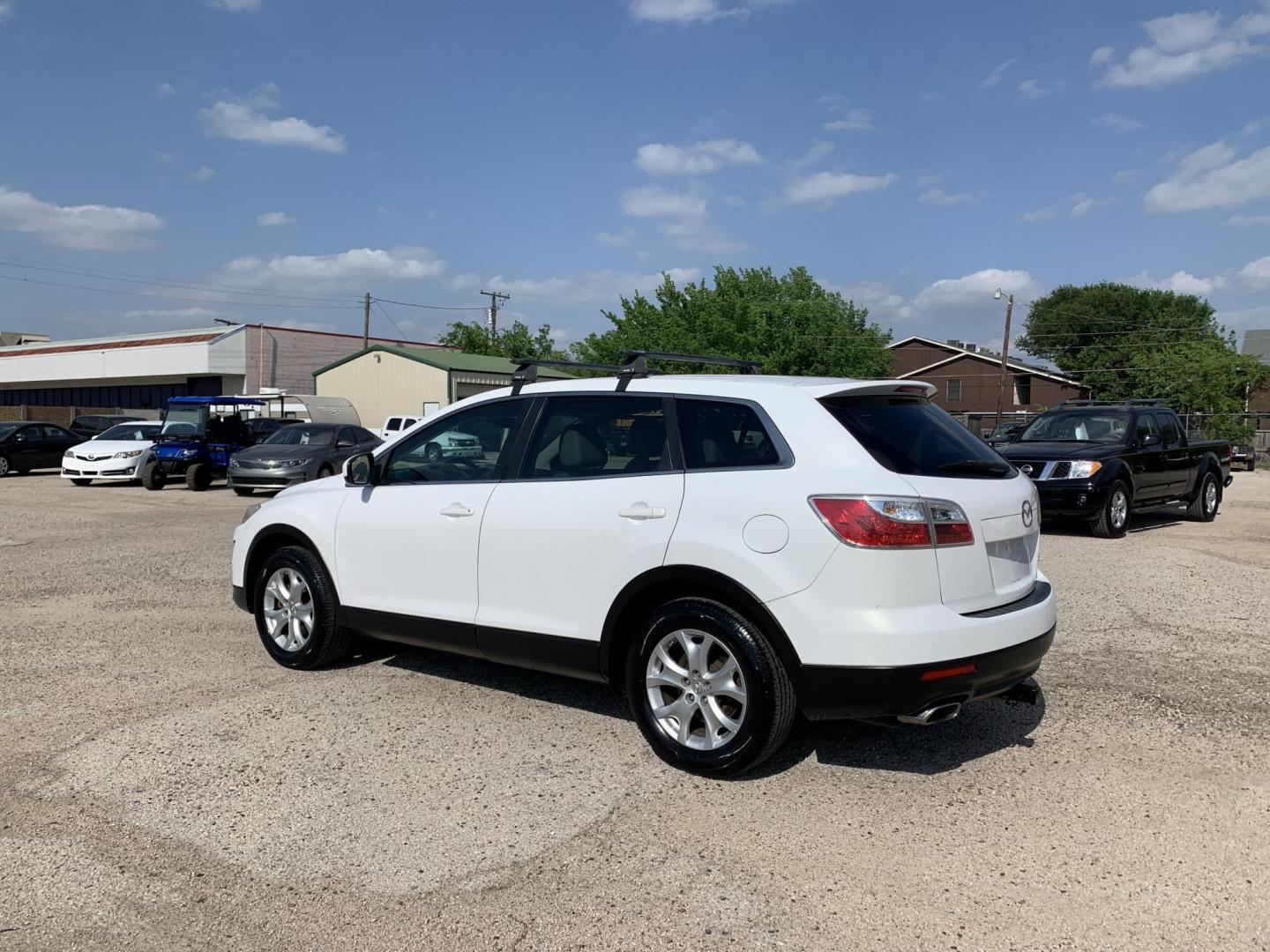 2012 White /Tan Mazda CX-9 Touring (JM3TB2CV8C0) with an 3.7L V6 DOHC 24V engine, Automatic transmission, located at 1830 North Belt Line Road, Irving, TX, 75061, (469) 524-0199, 32.834373, -96.993584 - Photo#3