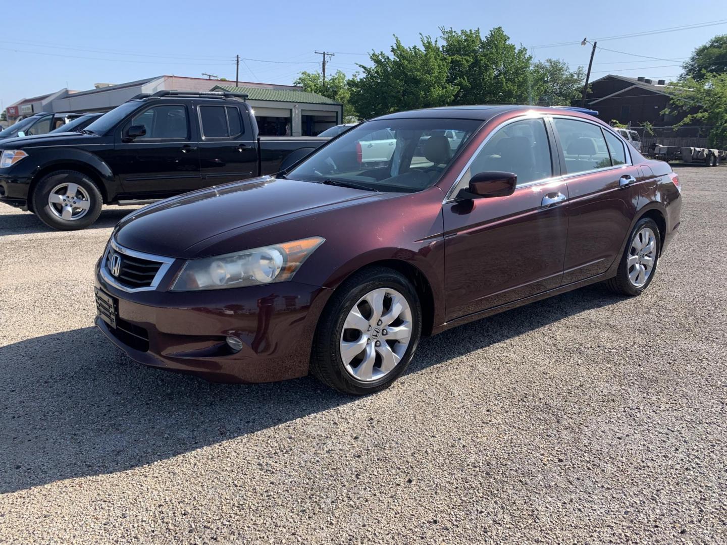 2010 Maroon /Tan Honda Accord EX-L V-6 Sedan AT (5KBCP3F85AB) with an 3.5L V6 SOHC 24V engine, Automatic transmission, located at 1830 North Belt Line Road, Irving, TX, 75061, (469) 524-0199, 32.834373, -96.993584 - Photo#0