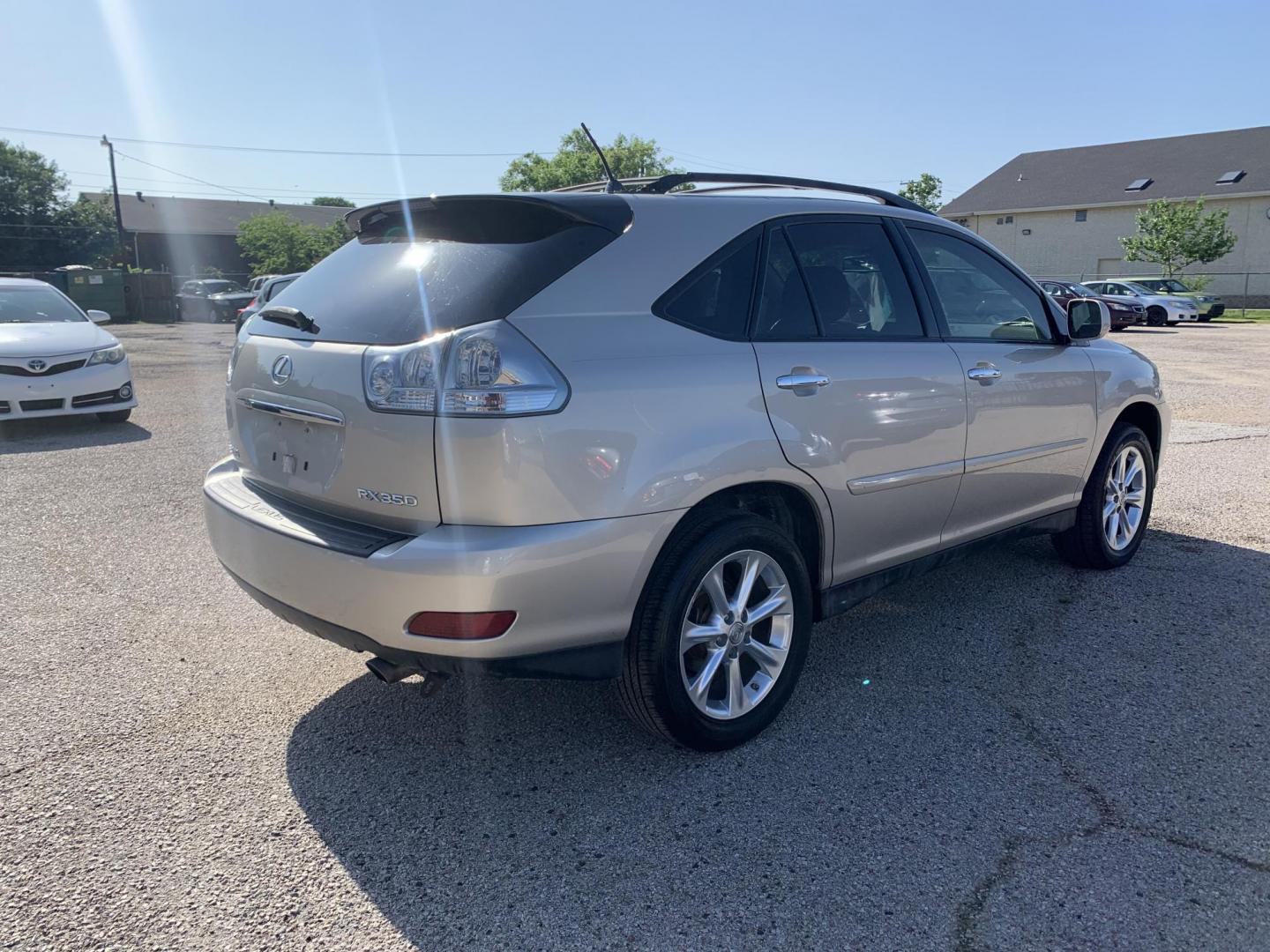 2008 Gold /Tan Lexus RX 350 FWD (2T2GK31U28C) with an 3.5L V6 DOHC 24V engine, Automatic transmission, located at 1830 North Belt Line Road, Irving, TX, 75061, (469) 524-0199, 32.834373, -96.993584 - Photo#1