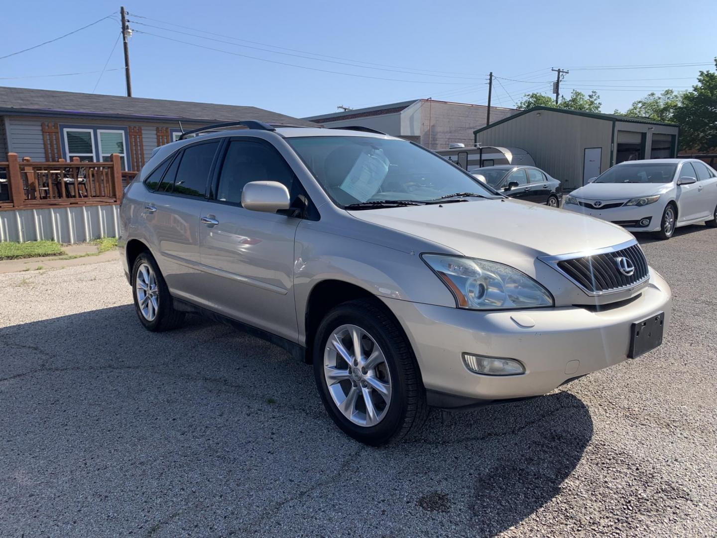 2008 Gold /Tan Lexus RX 350 FWD (2T2GK31U28C) with an 3.5L V6 DOHC 24V engine, Automatic transmission, located at 1830 North Belt Line Road, Irving, TX, 75061, (469) 524-0199, 32.834373, -96.993584 - Photo#6