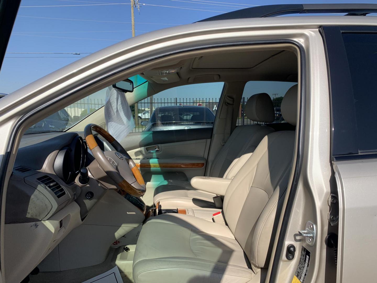 2008 Gold /Tan Lexus RX 350 FWD (2T2GK31U28C) with an 3.5L V6 DOHC 24V engine, Automatic transmission, located at 1830 North Belt Line Road, Irving, TX, 75061, (469) 524-0199, 32.834373, -96.993584 - Photo#7