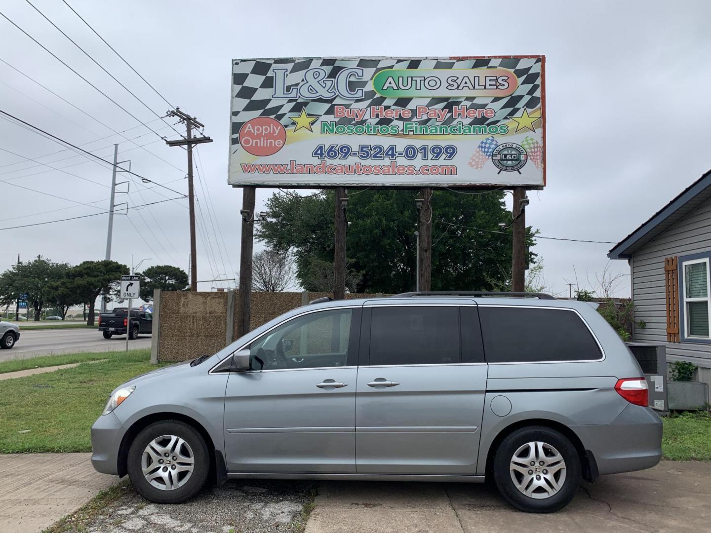 2006 Blue /gray Honda Odyssey EX-L w/ DVD and Navigation (5FNRL38736B) with an 3.5L V6 SOHC 24V engine, Automatic transmission, located at 1830 North Belt Line Road, Irving, TX, 75061, (469) 524-0199, 32.834373, -96.993584 - Photo#0