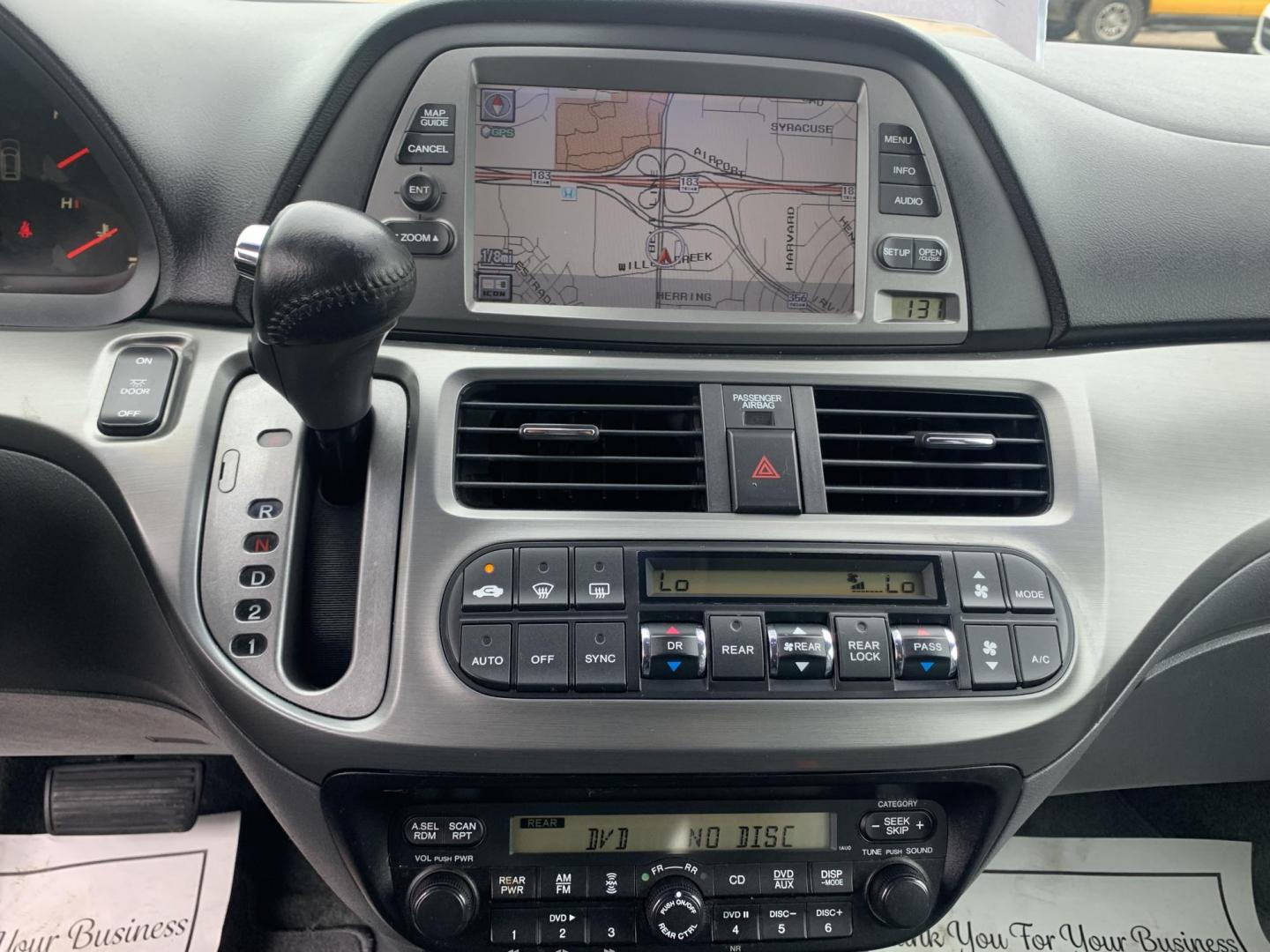 2006 Blue /gray Honda Odyssey EX-L w/ DVD and Navigation (5FNRL38736B) with an 3.5L V6 SOHC 24V engine, Automatic transmission, located at 1830 North Belt Line Road, Irving, TX, 75061, (469) 524-0199, 32.834373, -96.993584 - Photo#16