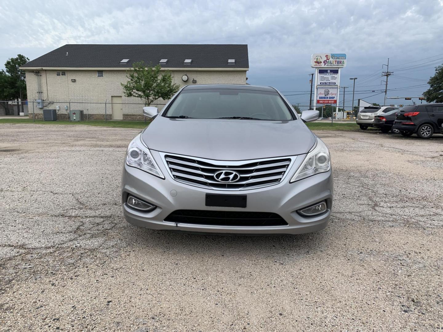 2012 Silver /Tan Hyundai Azera 3.3L (KMHFH4JG9CA) with an 3.3L V6 DOHC 24V engine, Automatic transmission, located at 1830 North Belt Line Road, Irving, TX, 75061, (469) 524-0199, 32.834373, -96.993584 - Photo#1