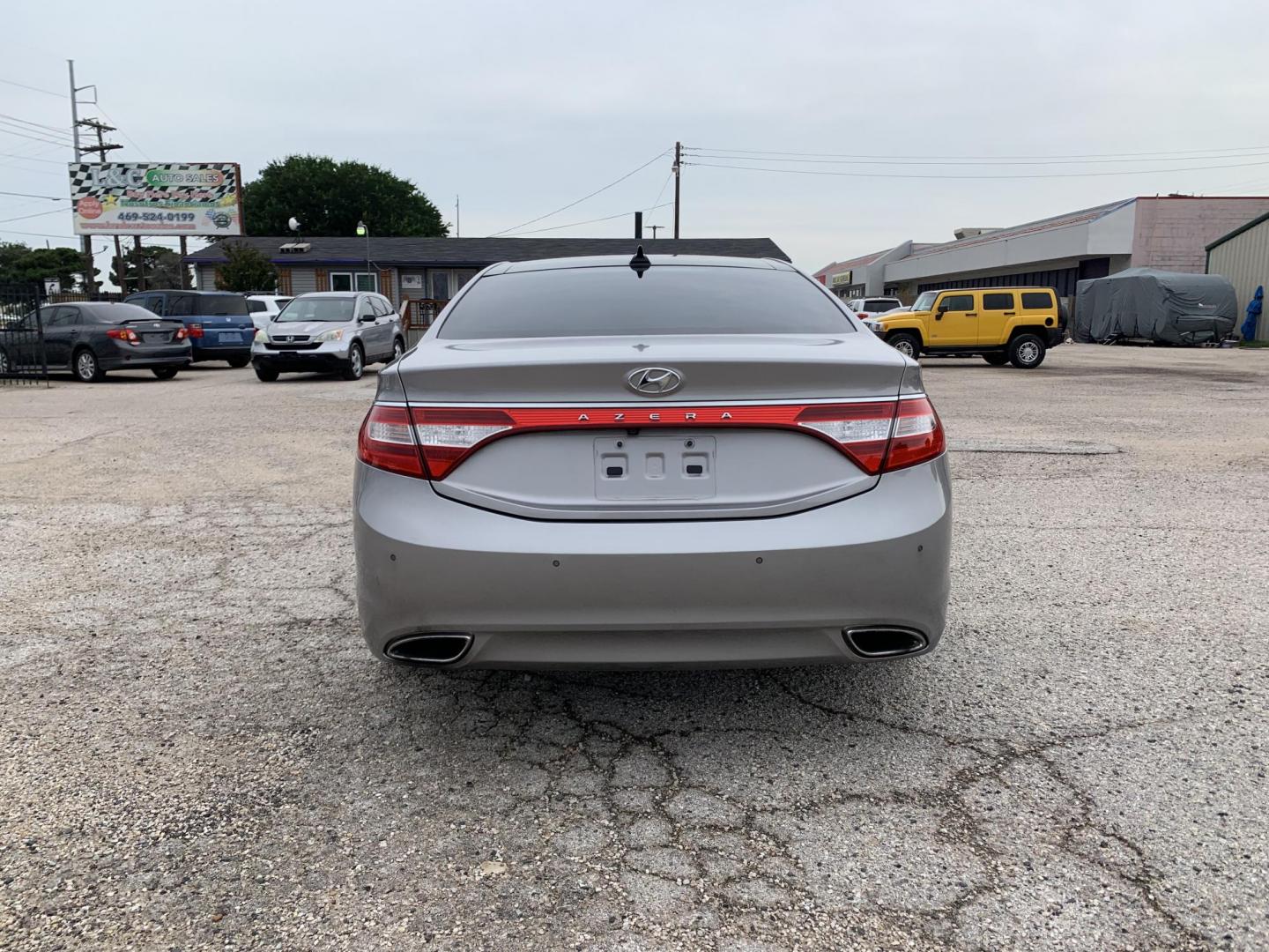 2012 Silver /Tan Hyundai Azera 3.3L (KMHFH4JG9CA) with an 3.3L V6 DOHC 24V engine, Automatic transmission, located at 1830 North Belt Line Road, Irving, TX, 75061, (469) 524-0199, 32.834373, -96.993584 - Photo#2